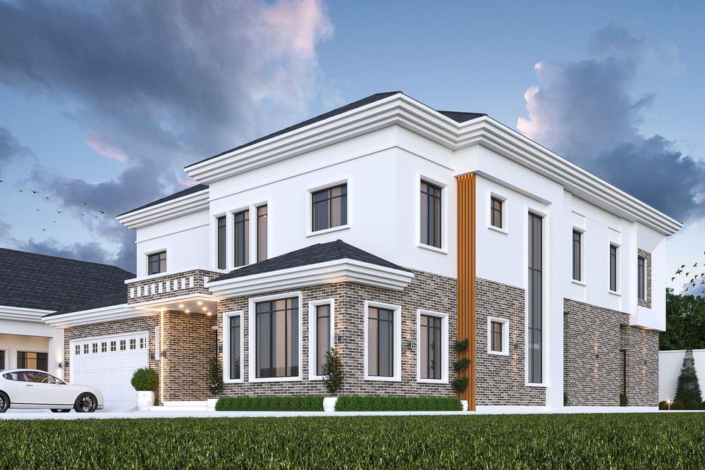 The six-bedroom villa in the hipped-roof option at dusk, a stone-clad ground floor beneath white render with an attached double garage to one side