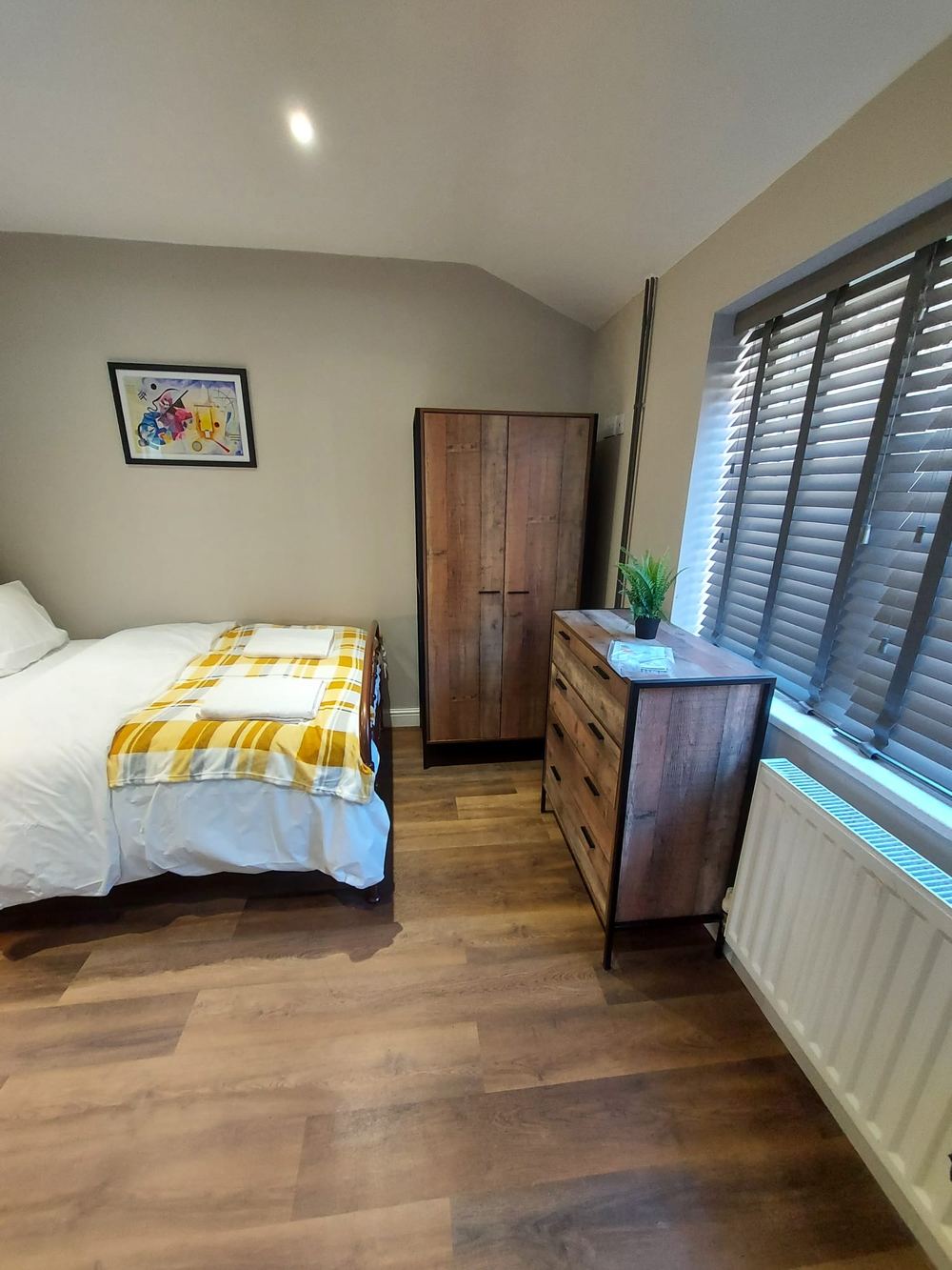 Yarmouth Road — Bedroom, with shutters to the garden